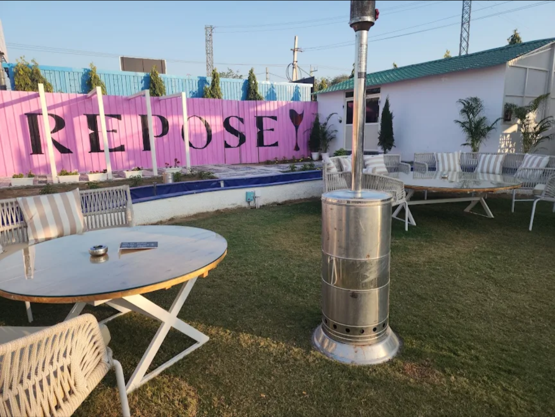 Ground-level seating area with Repose brand wall