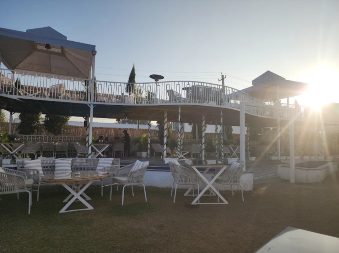 Daytime lawn seating view at Repose BYOB Club